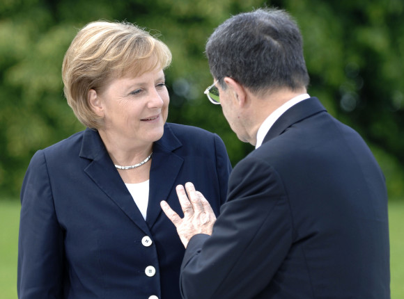 German Chancellor Angela Merkel talking to Italian Prime Minister Romano Prodi