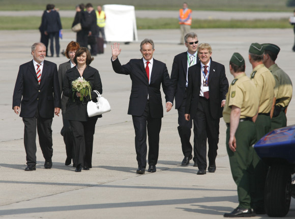 British Prime Minister Tony Blair and his wife, Cherie Blair, are welcomed at Rostock-Laage Airport by Harald Ringstorff, Minister-President of Mecklenburg-Western Pomerania