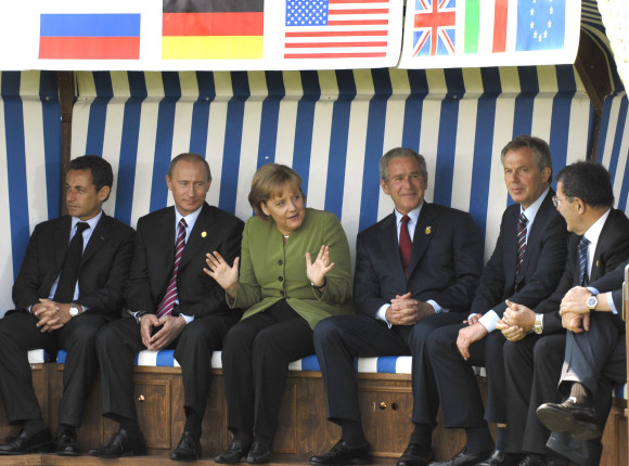 German Chancellor Angela Merkel sitting with the G8 Heads of State and Government in a wicker beach chair