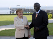 German Chancellor Angela Merkel welcomes John A. Kufuor, President of Ghana, to Heiligendamm