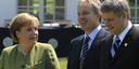 German Chancellor Angela Merkel talking to Tony Blair and Stephen Harper