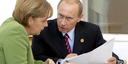German Chancellor Angela Merkel and Russia's President Vladimir Putin talking on the terrace after the working session